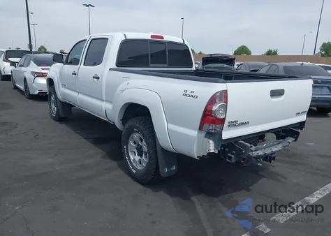 2009 Toyota Tacoma Base V6 z USA, uszkodzony, nr VIN 3TMMU52N79M014709